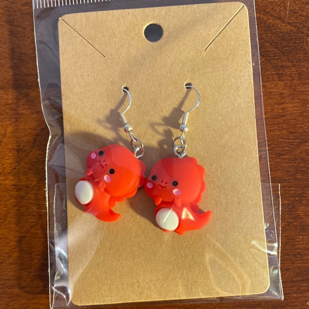 Red dinosaur earrings